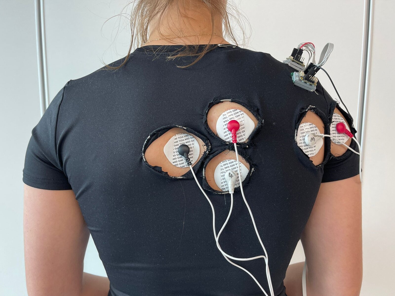 Neuromorphic Robotic Control Using EMG and IMU Integration